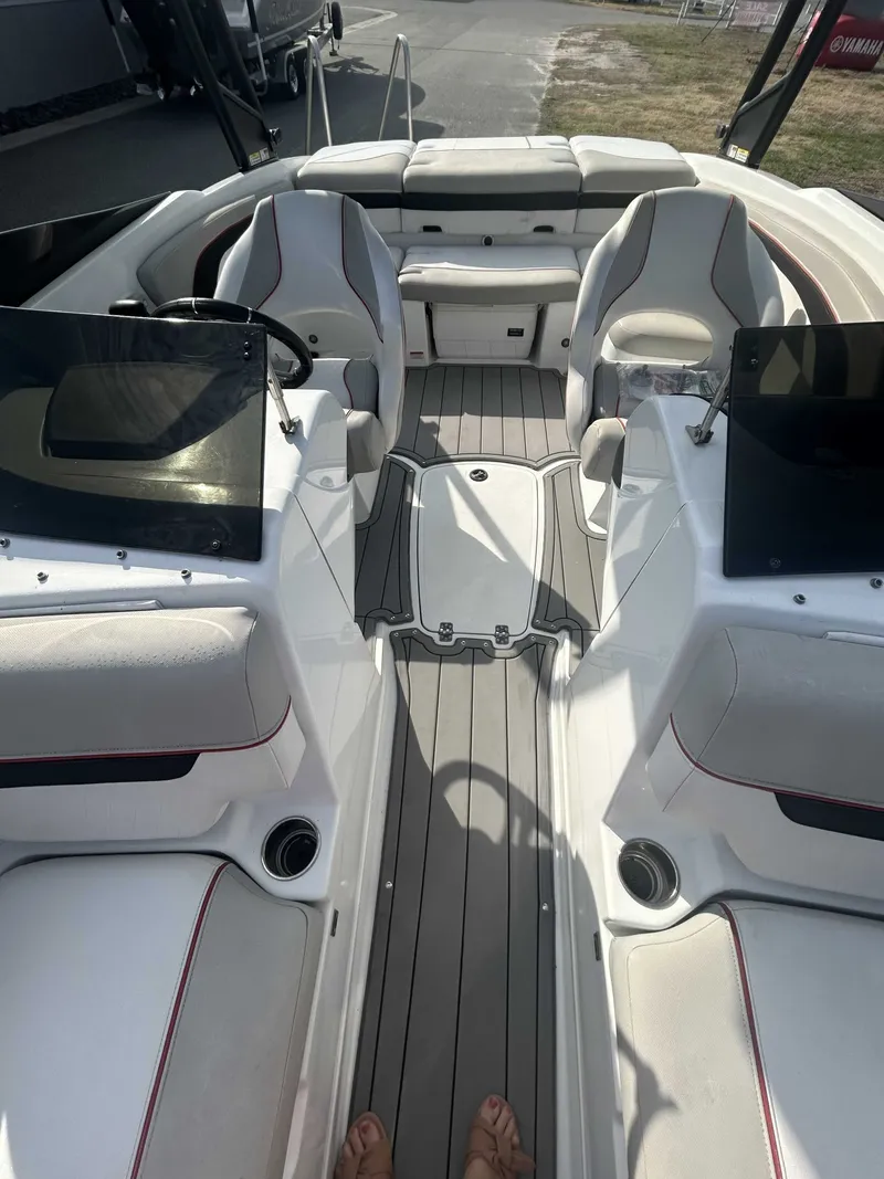 Slide: The Image of Interior of a 2019 Tahoe 700 Limited boat with gray seating. - 7