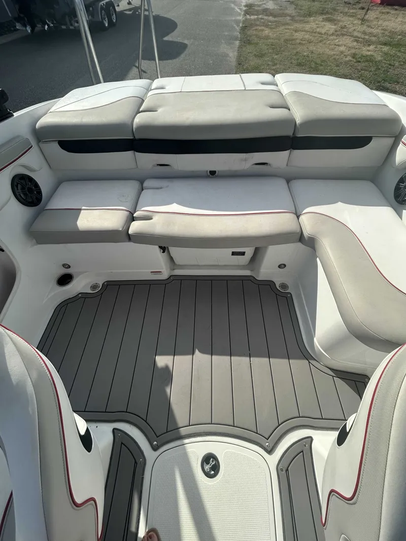Slide: The Image of Interior of a 2019 Tahoe 700 Limited boat with gray seating. - 9