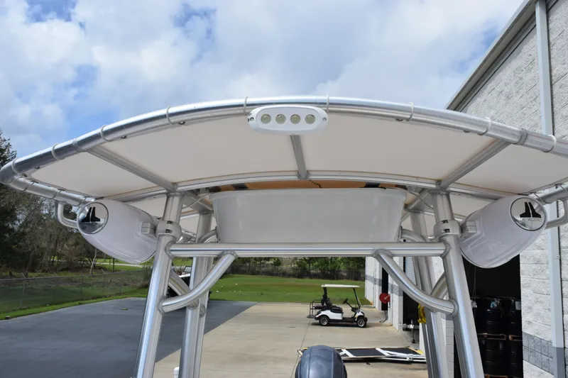 Slide: The Image of 2019 Sportsman Heritage 211 Center Console T-top with speakers and lighting. - 14