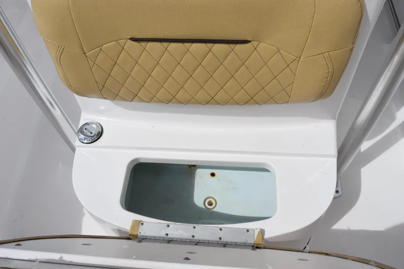 Slide: The Image of 2019 Sportsman Heritage 211 Center Console seat with storage compartment. - 16