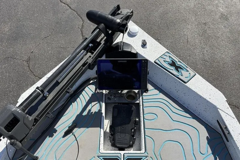 Slide: The Image of Bow of 2022 Xpress X19 Pro boat with trolling motor and navigation system. - 10