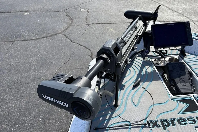 Slide: The Image of Xpress X19 Pro 2022 boat with Lowrance trolling motor and navigation system on deck. - 11