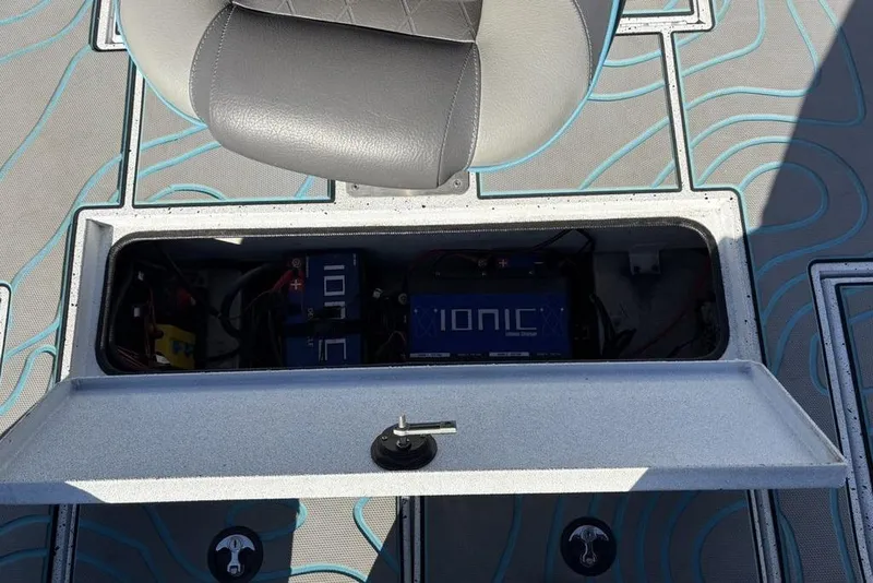 Slide: The Image of Battery compartment of 2022 Xpress X19 Pro boat with Ionic lithium batteries. - 29