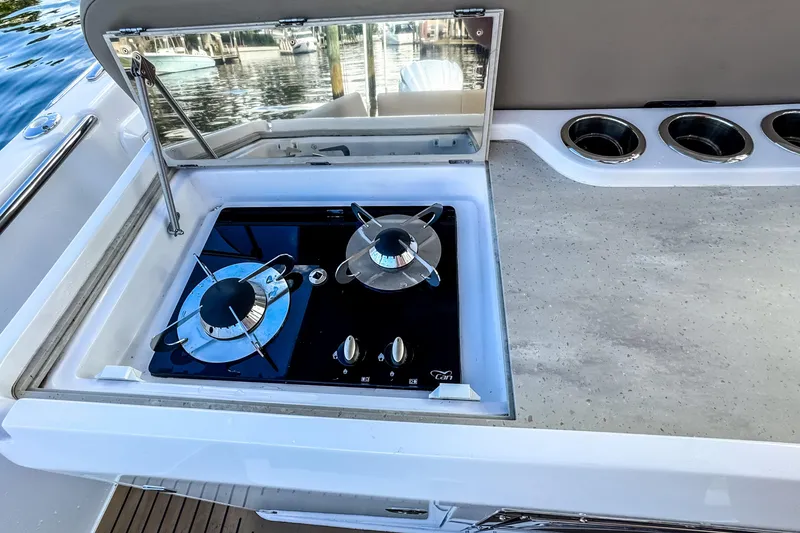 Slide: The Image of STERK 31 boat kitchen with gas stove, 2025 model. - 11