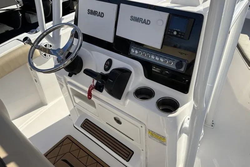 Slide: The Image of Helm console of a 2018 Tidewater 210 LXF boat with Simrad electronics. - 19