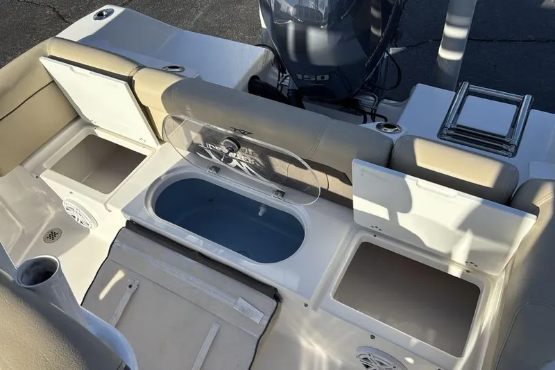 Slide: The Image of Interior view of a 2018 Tidewater 210 LXF boat with storage compartments. - 26