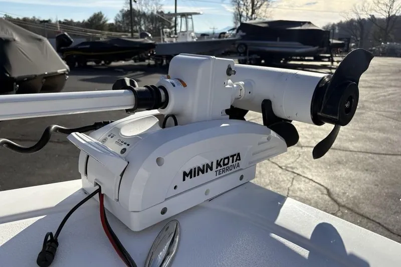 Slide: The Image of Minn Kota Terrova trolling motor on 2018 Tidewater 210 LXF boat, outdoor setting. - 6
