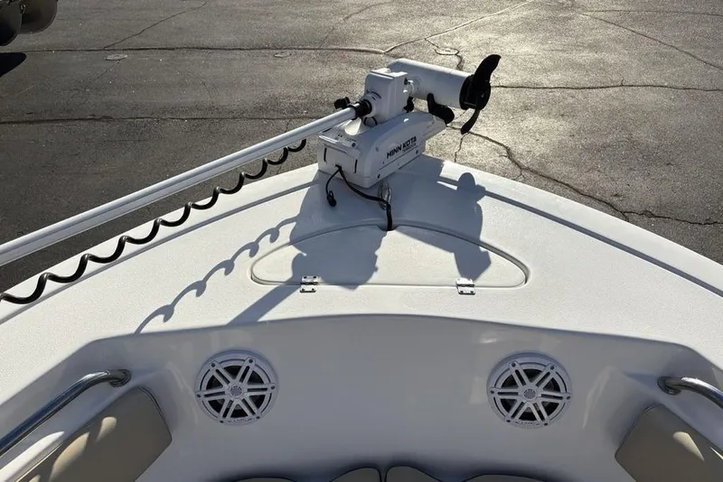 Slide: The Image of 2018 Tidewater 210 LXF boat with Minn Kota trolling motor on deck. - 8