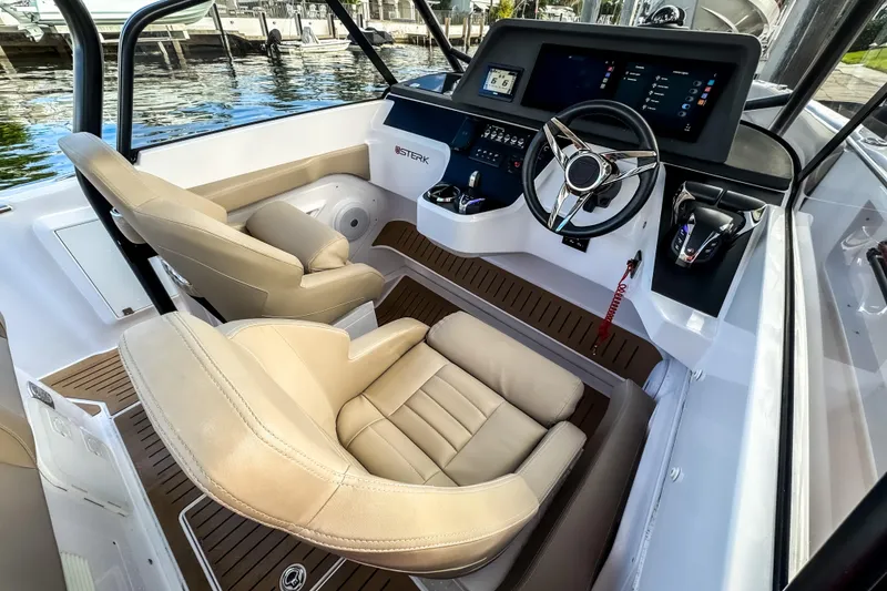 Slide: The Image of Interior of STERK 31 boat, 2025 model, featuring modern helm console. - 14