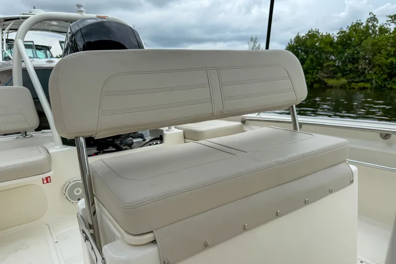 Slide: The Image of Boston Whaler 170 Montauk 2026, seating area on water. - 7