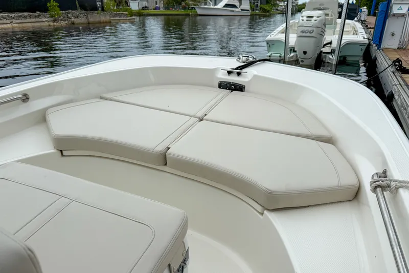 Slide: The Image of Boston Whaler 170 Montauk 2026 on calm water at dock. - 9