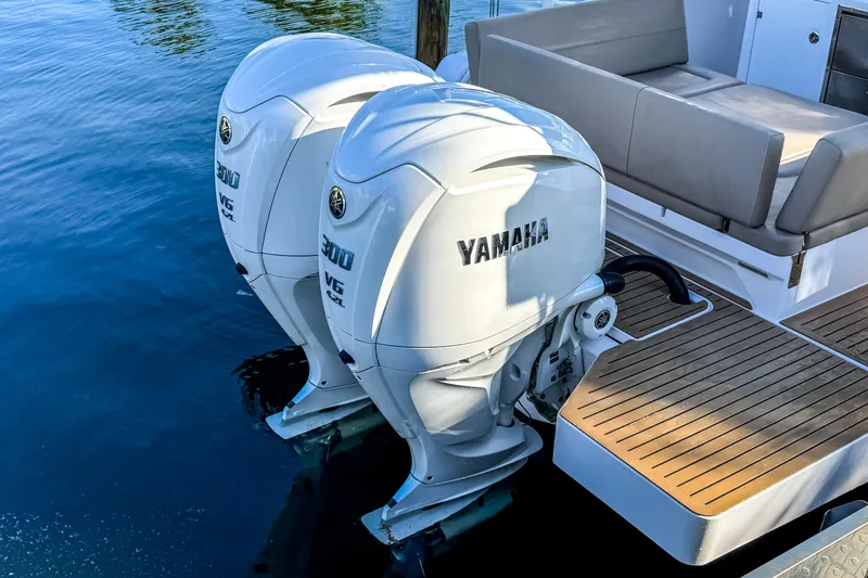 Slide: The Image of Two Yamaha outboard motors on a 2025 STERK 31 boat. - 5