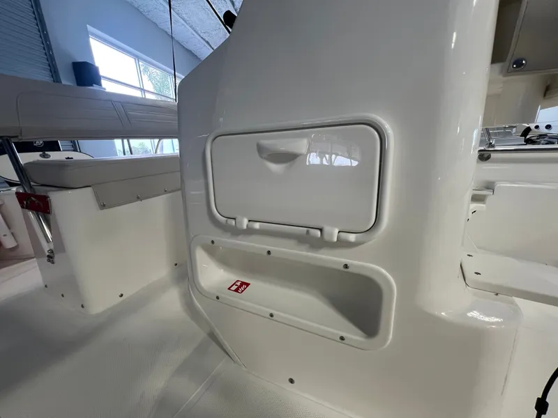 Slide: The Image of Interior view of the 2026 Boston Whaler 150 Montauk boat. - 24