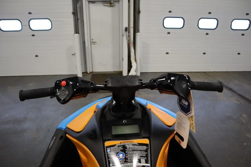 Slide: The Image of 2026 Sea-Doo Spark Trixx for 3 handlebars in a garage setting. - 20