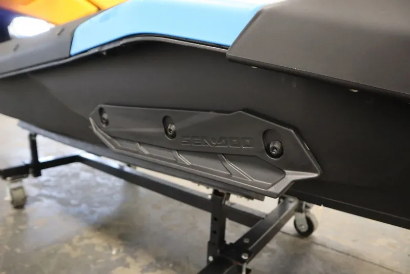 Slide: The Image of 2026 Sea-Doo Spark Trixx for 3, close-up of hull design on stand. - 16