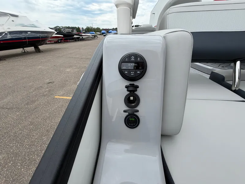 Slide: The Image of 2026 Harris Grand Mariner 230 boat features and controls. - 10