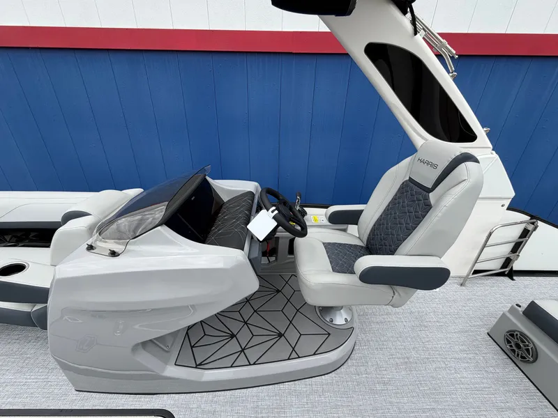 Slide: The Image of Interior of 2026 Harris Grand Mariner 230 with modern helm station. - 18