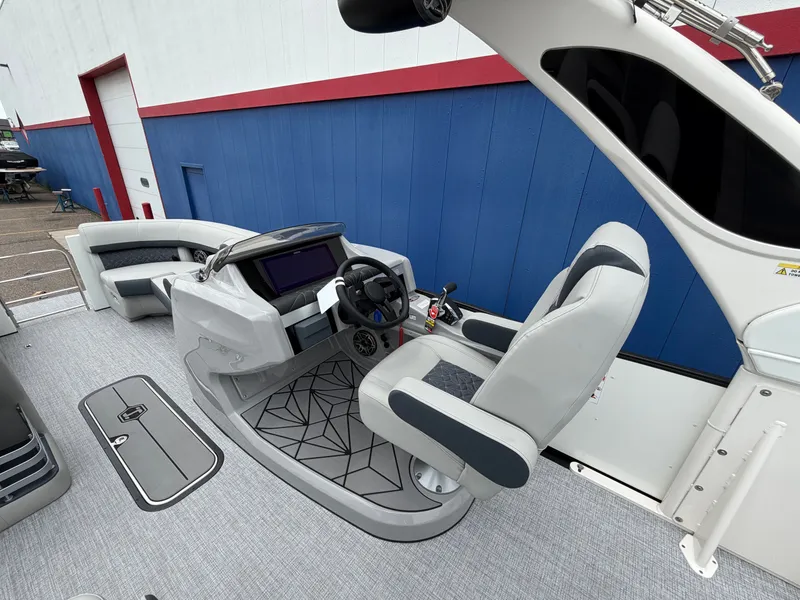 Slide: The Image of Interior of 2026 Harris Grand Mariner 230 with modern helm station. - 19