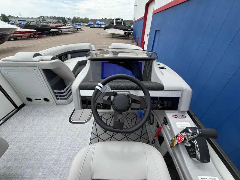 Slide: The Image of Interior view of the 2026 Harris Grand Mariner 230 boat. - 20
