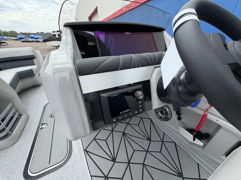 Slide: The Image of Interior view of the 2026 Harris Grand Mariner 230 boat. - 23