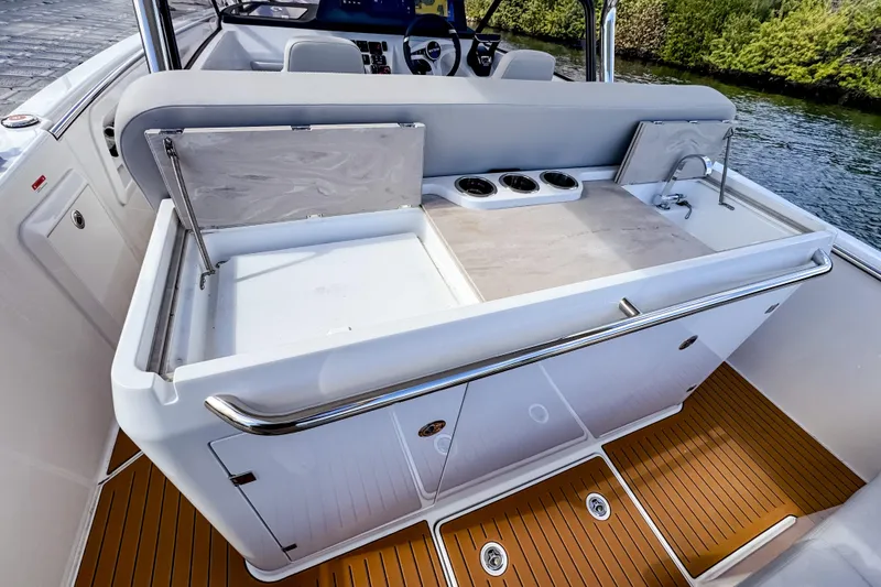Slide: The Image of 2025 STERK 31 boat interior with sleek kitchen area and modern design. - 8