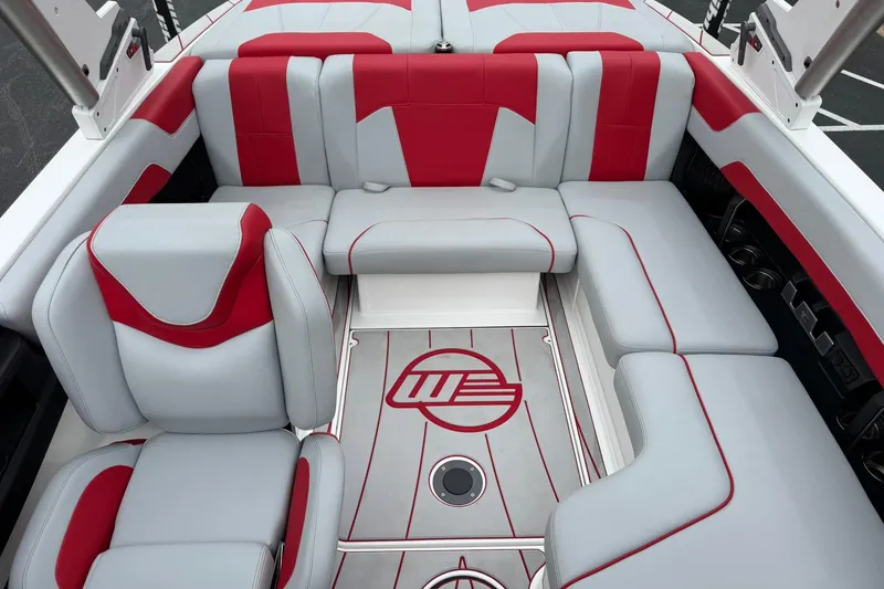 Slide: The Image of 2023 Malibu Wakesetter 20 VTX interior with red and gray seating design. - 17