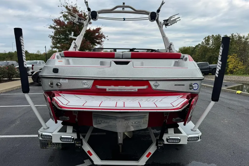 Slide: The Image of 2023 Malibu Wakesetter 20 VTX boat, rear view, parked outdoors. - 4