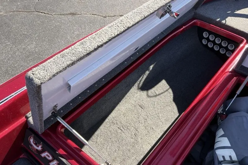 Slide: The Image of 2017 Phoenix 919 ProXP boat dashboard with Garmin and Lowrance fish finders. - 12