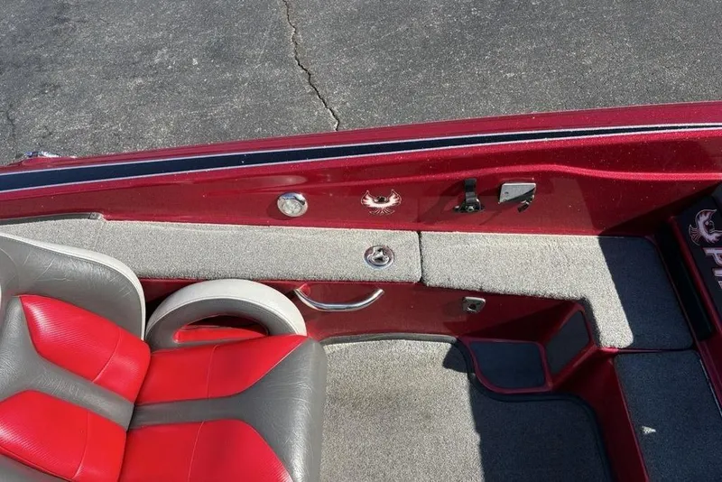 Slide: The Image of 2017 Phoenix 919 ProXP boat dashboard with steering wheel and navigation display. - 23