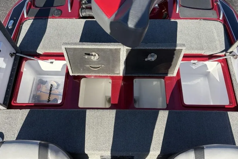 Slide: The Image of 2017 Phoenix 919 ProXP boat deck with gray carpet and seating. - 29