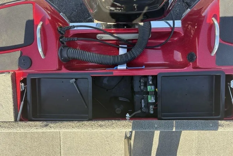 Slide: The Image of 2017 Phoenix 919 ProXP boat storage compartments with open lids, showcasing interior space. - 30