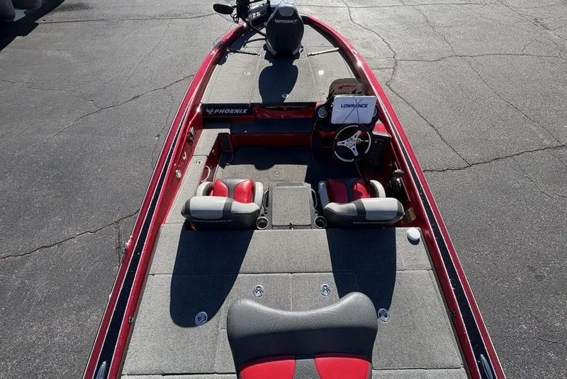 Slide: The Image of 2017 Phoenix 919 ProXP boat interior showing storage compartments and battery setup. - 31