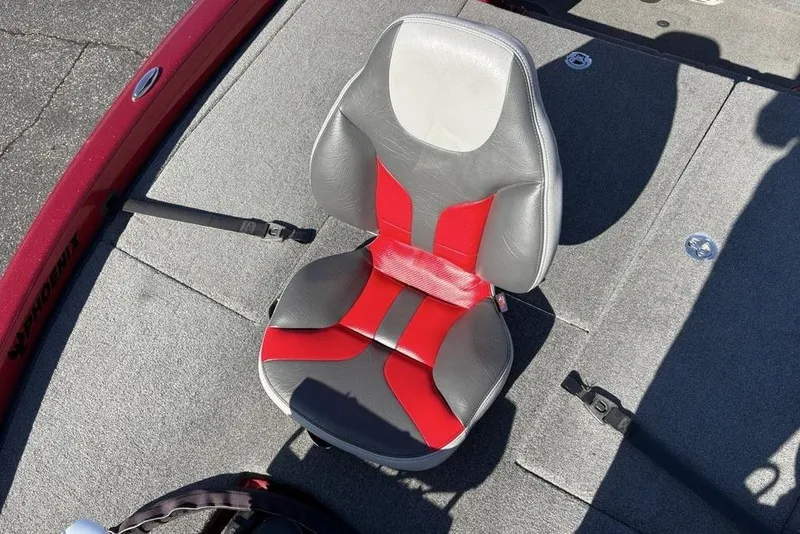 Slide: The Image of 2017 Phoenix 919 ProXP boat with Mercury engine, parked outdoors on a trailer. - 6