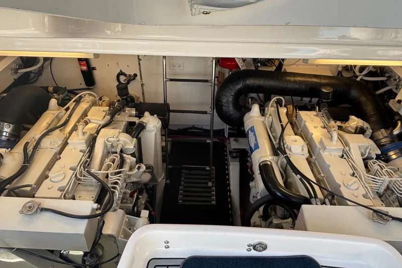 Slide: The Image of Engine room of 2004 Tiara Yachts 3600 Sovran, showcasing dual engines and mechanical components. - 17