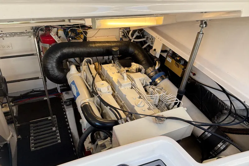Slide: The Image of Engine room of 2004 Tiara Yachts 3600 Sovran, showcasing detailed mechanical components. - 18
