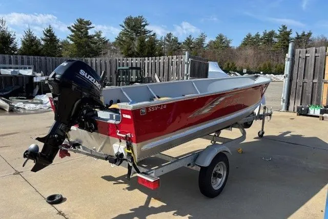 Slide: The Image of 2023 Lund SSV-14 Tiller boat on trailer, featuring a Suzuki outboard motor. - 7