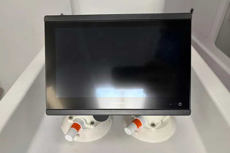 Slide: The Image of Garmin display screen on Tripp 47, 1995 model, mounted with suction cups. - 34