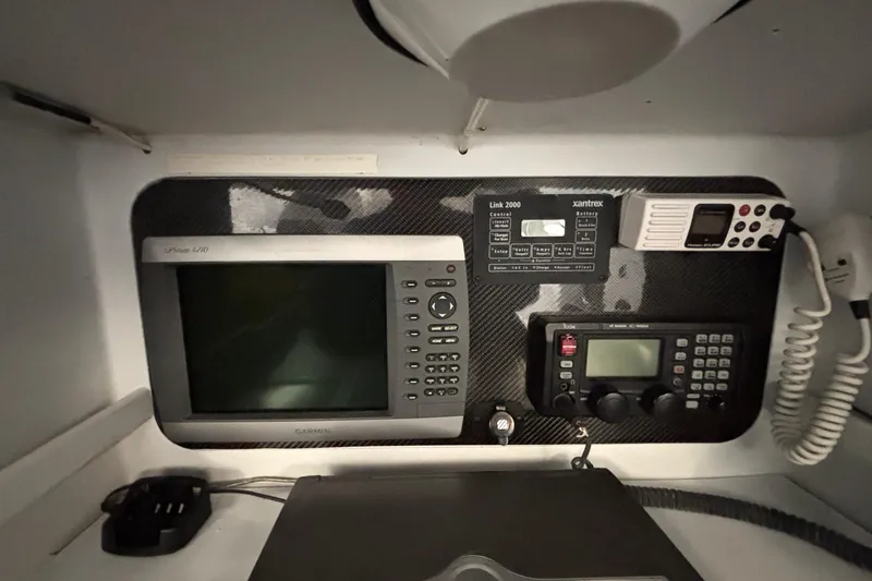 Slide: The Image of Navigation and communication equipment in a 1995 Tripp 47 yacht interior. - 37
