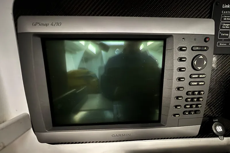 Slide: The Image of Garmin GPSmap 4210 device on a Tripp 47 yacht, model year 1995. - 38
