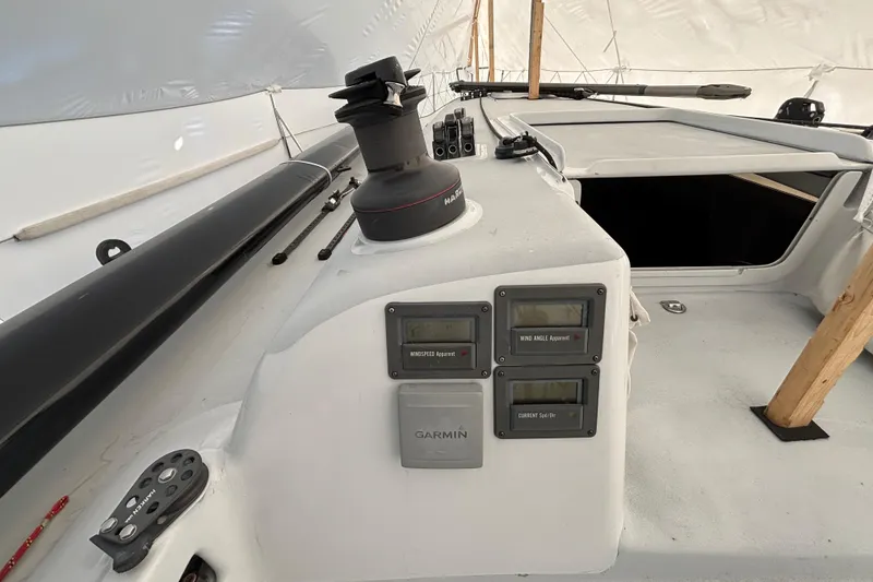 Slide: The Image of Sailboat cockpit of 1995 Tripp 47 with Garmin instruments and winch. - 45