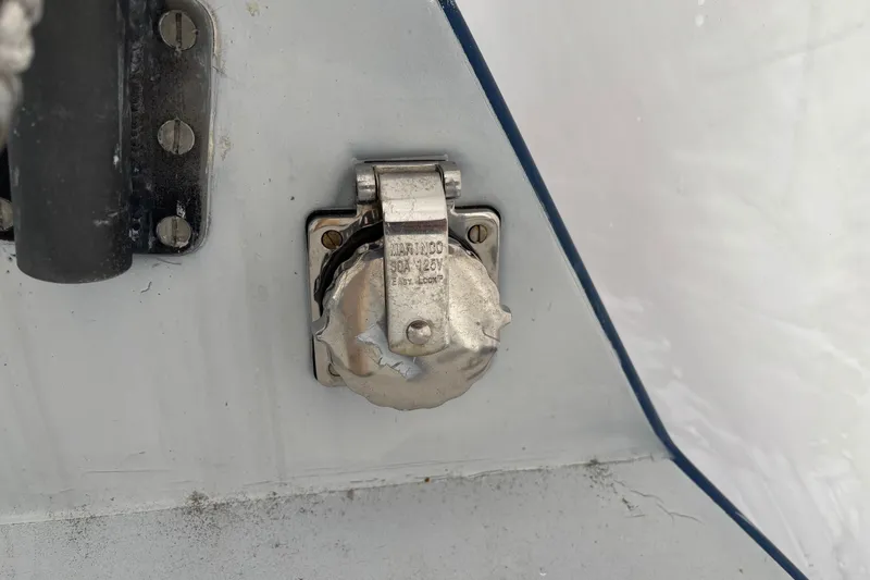 Slide: The Image of Metallic marine fitting on a Tripp 47 yacht, model year 1995. - 52