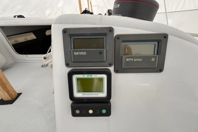 Slide: The Image of Boat dashboard with speed and depth displays, Tripp 47, 1995 model. - 56