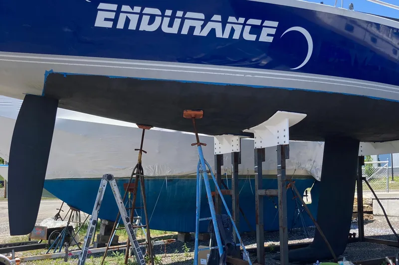 Slide: The Image of Sailboat "Endurance" on dry dock, Tripp 47 model, 1995, undergoing maintenance. - 7