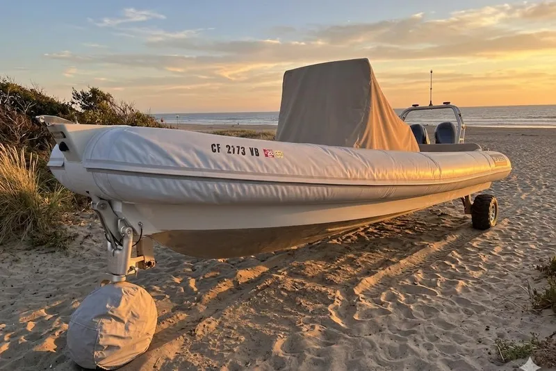 The Image of 2020 Sealegs 9m Amphibious RIB on sandy beach at sunset. - 0