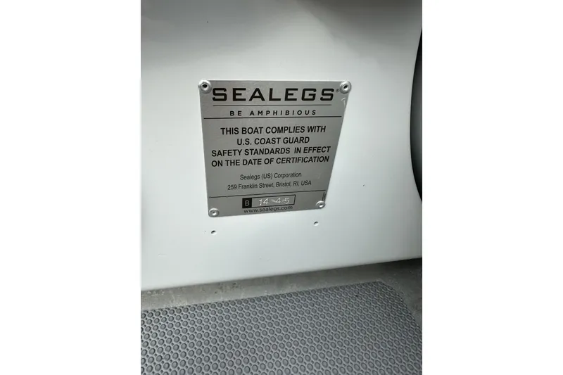 Slide: The Image of Plaque on 2020 Sealegs 9m Amphibious RIB, U.S. Coast Guard safety compliance. - 23