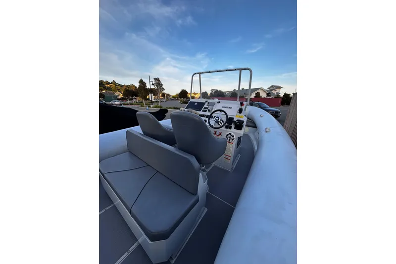 Slide: The Image of 2020 Sealegs 9m Amphibious RIB interior with steering console and seating. - 5