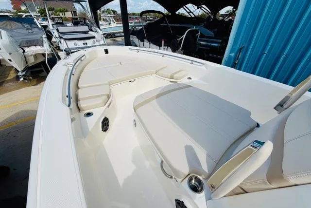 Slide: The Image of 2026 Boston Whaler 250 Dauntless boat interior with spacious seating and modern design. - 10