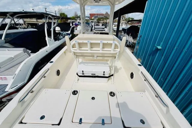 Slide: The Image of 2026 Boston Whaler 250 Dauntless boat interior, featuring spacious deck and seating area. - 5