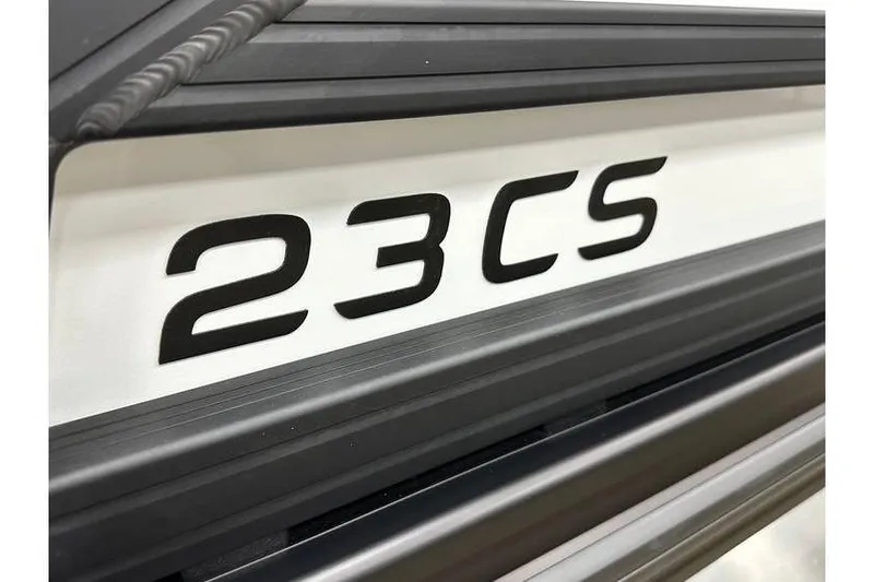 Slide: The Image of Close-up of Evotti 723CS 2026 model badge on vehicle exterior. - 11