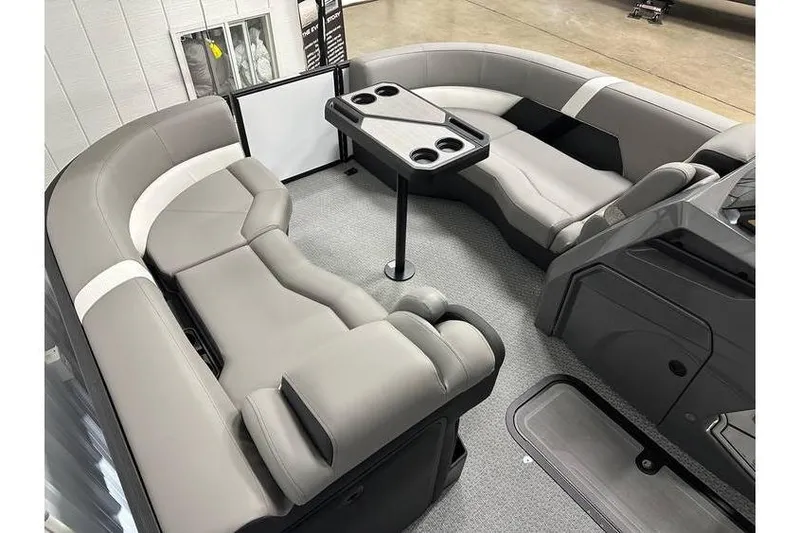 Slide: The Image of Luxurious interior of 2026 Evotti 723CS boat with plush seating and table. - 18